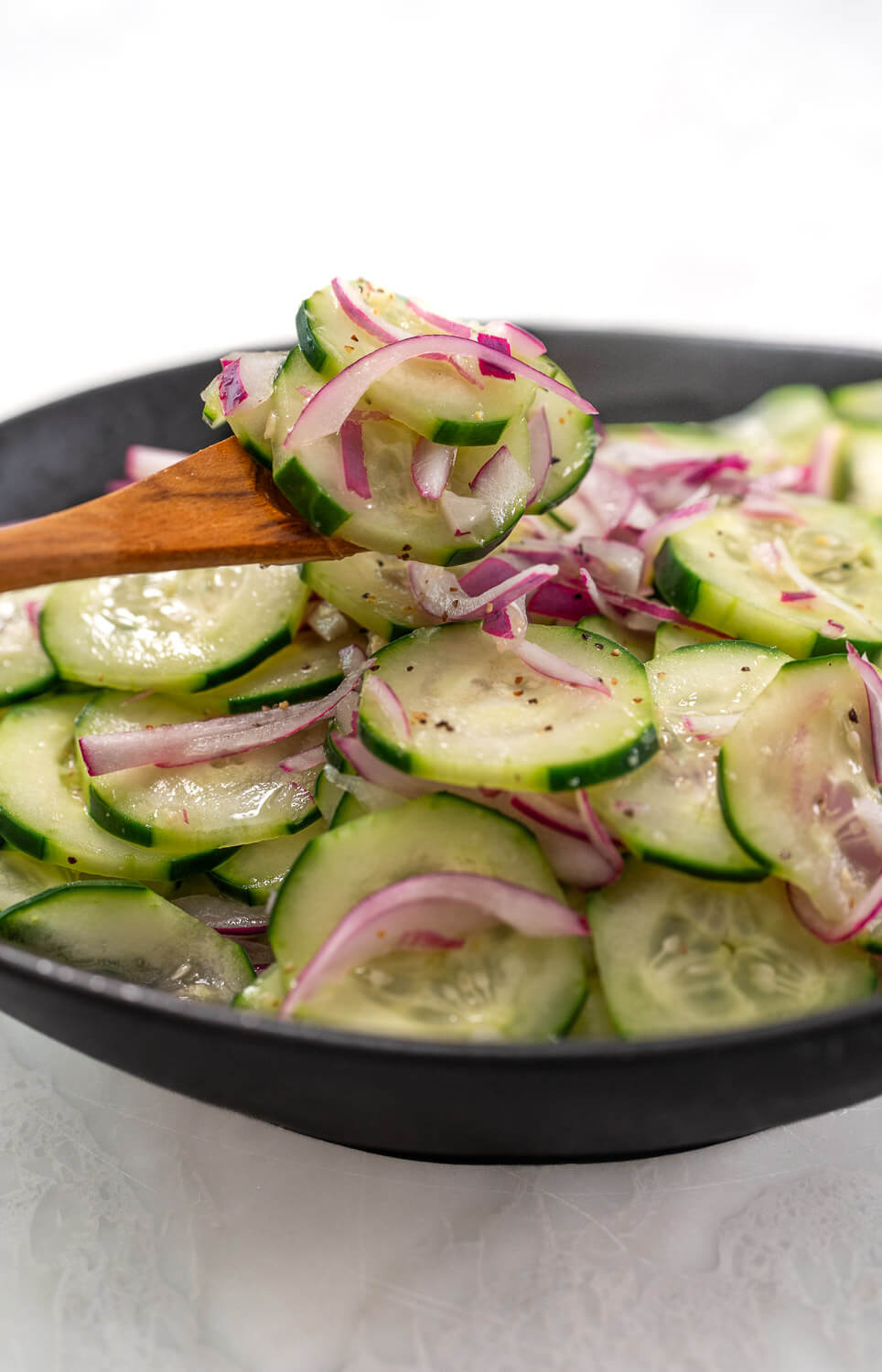 Pipino Salad on a spoon ready to be served