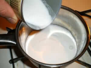 How to cook latik - pour coconut milk into a pot