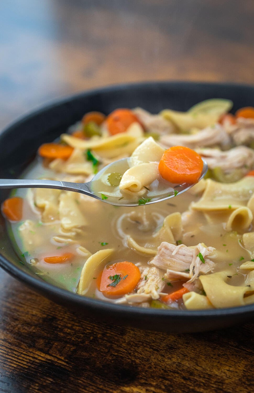Soup being scooped by a spoon