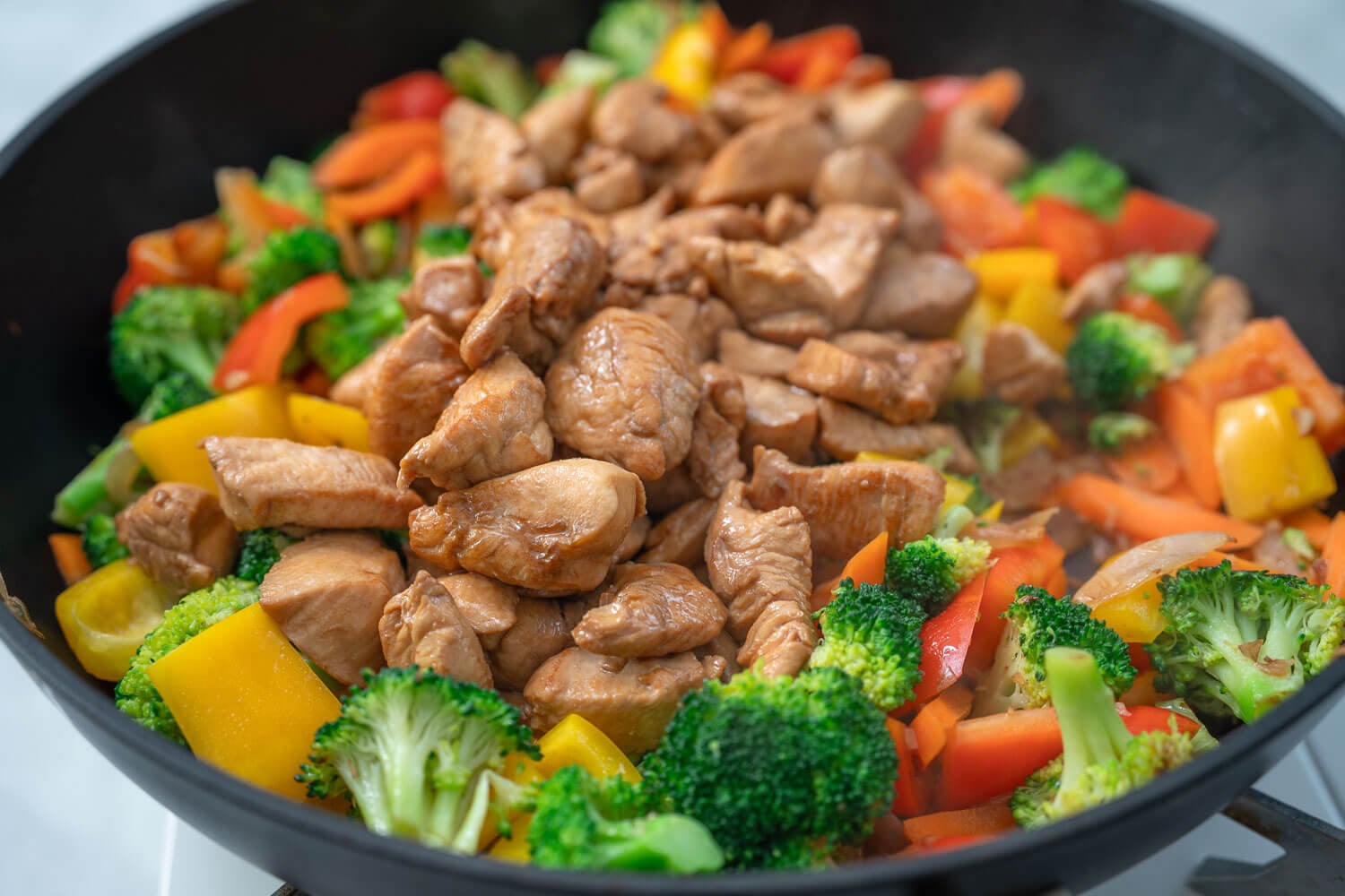 Chicken stir fry in a wok