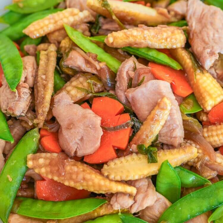 Chicken stir fry with young corn and snow peas
