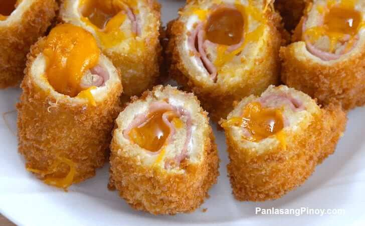 https://panlasangpinoy.com/wp-content/uploads/2013/01/Deep-Fried-Ham-and-Chees-Roll.jpg