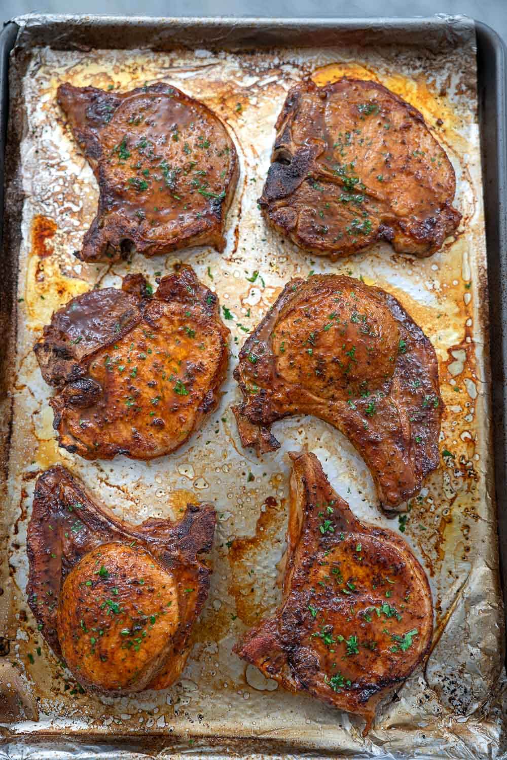 Pork chops on a tray right out of the oven