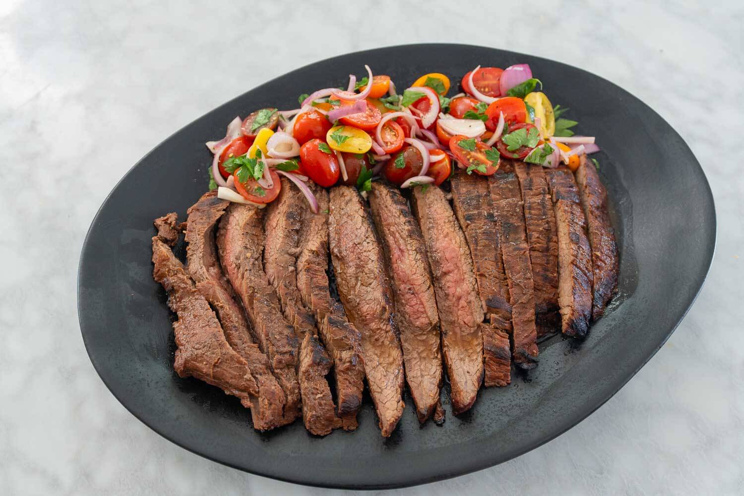 Sliced marinated and grilled flank steak