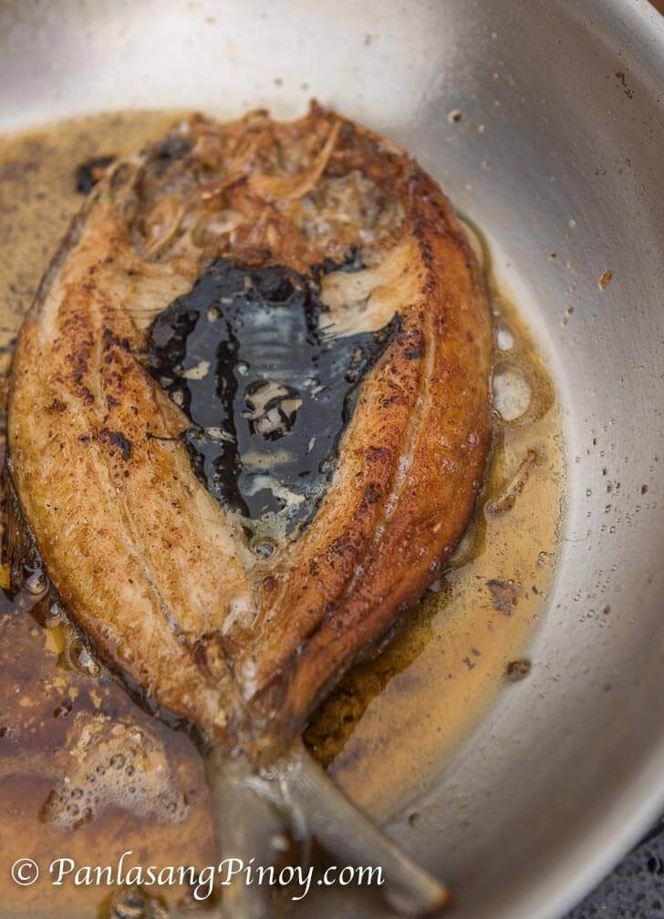 Daing na Bangus Frying on a Pan