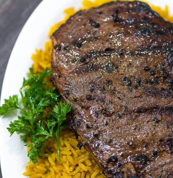Grilled Rib Eye Steak with Arroz Amarillo