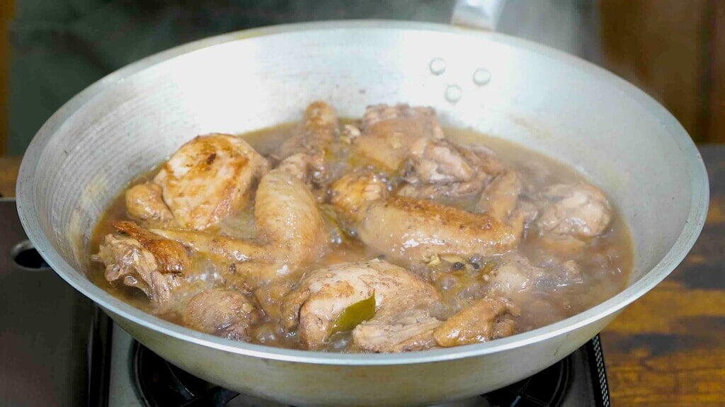 Stew your chicken adobo until tender