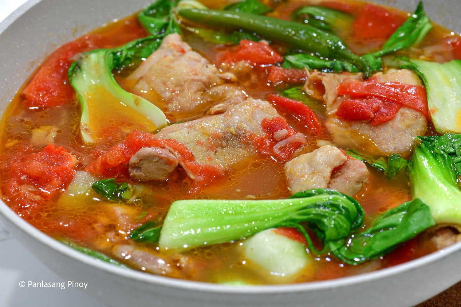 Chicken soup with tomatoes