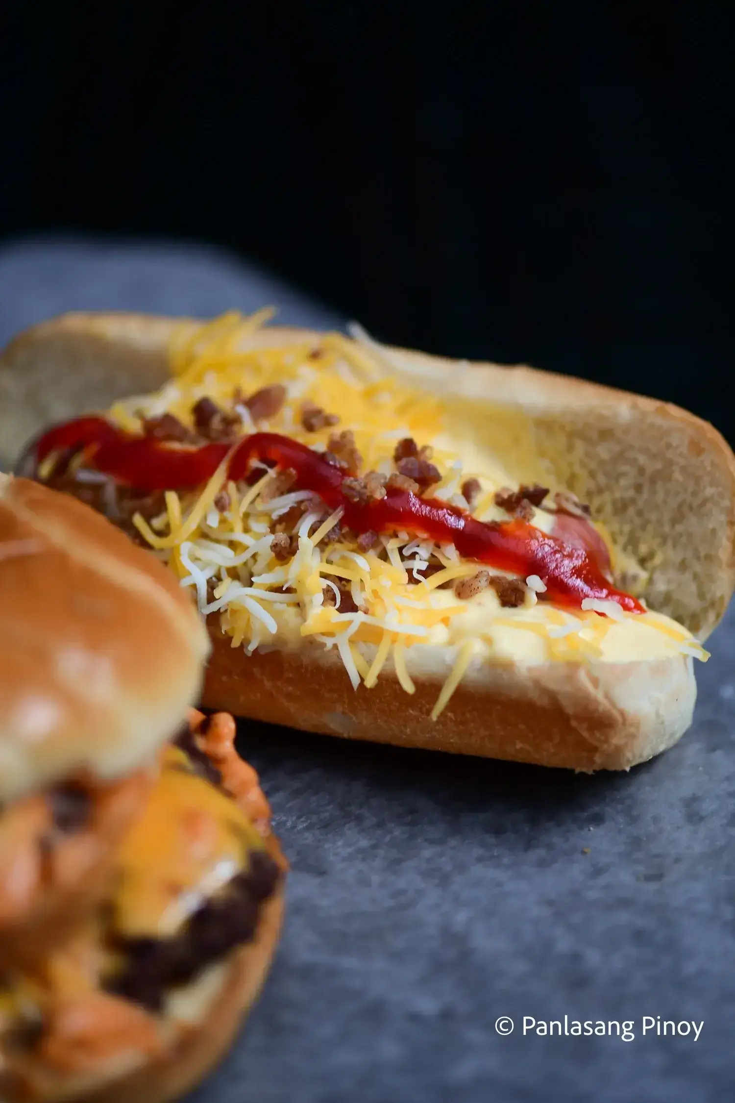 cheeseburger and hotdog sandwich