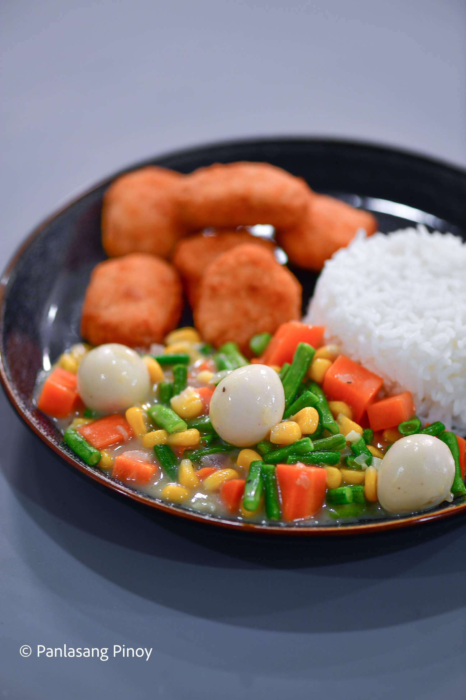 chicken nuggets with rice and vegetables