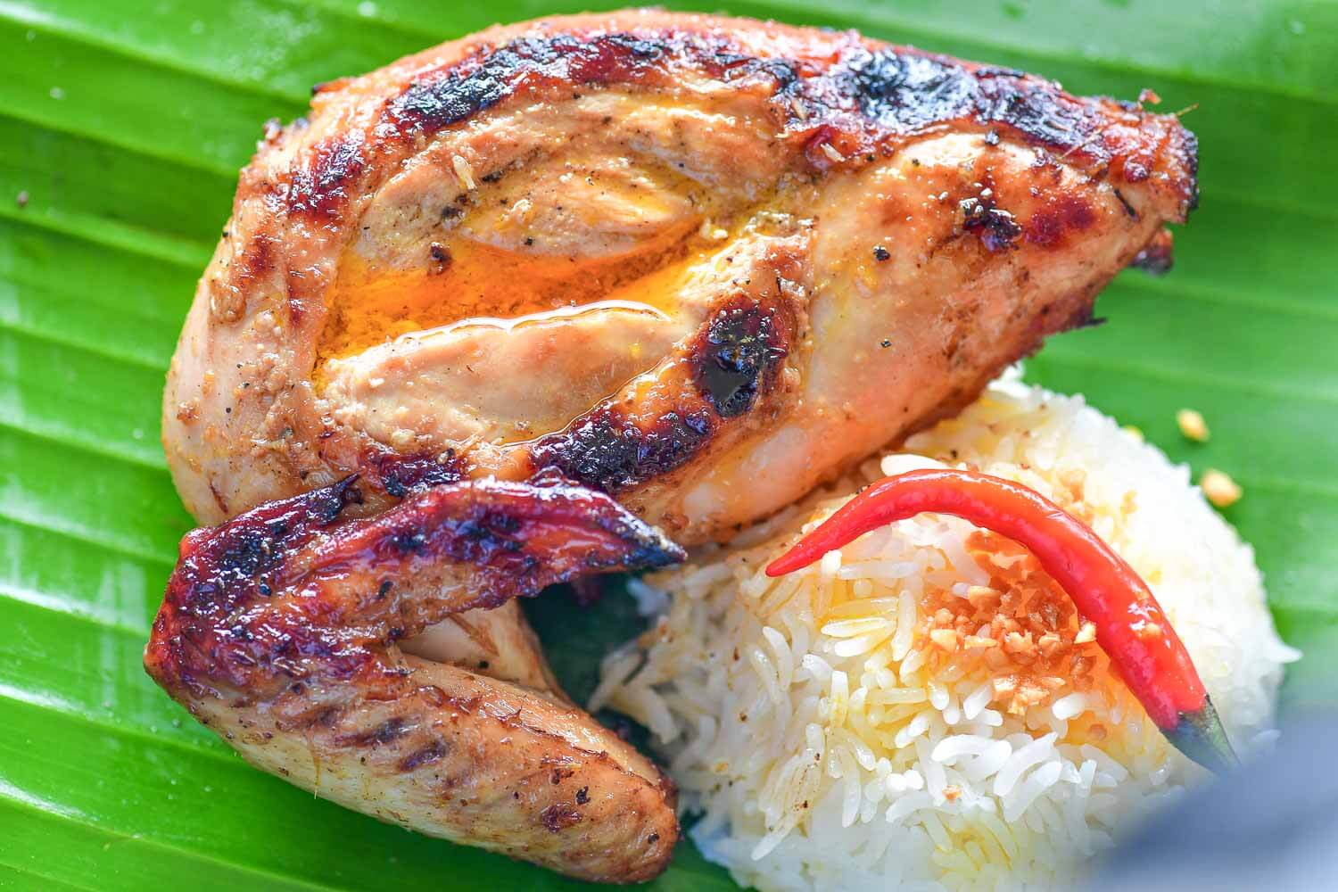 Chicken Inasal over banana leaf