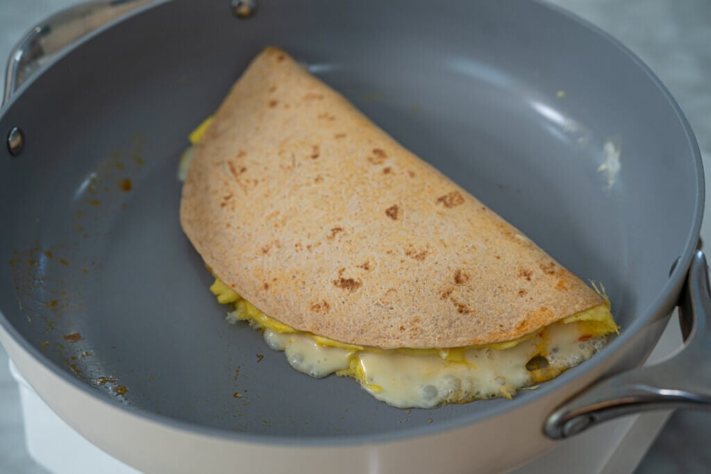 Breakfast quesadilla - melt the cheese
