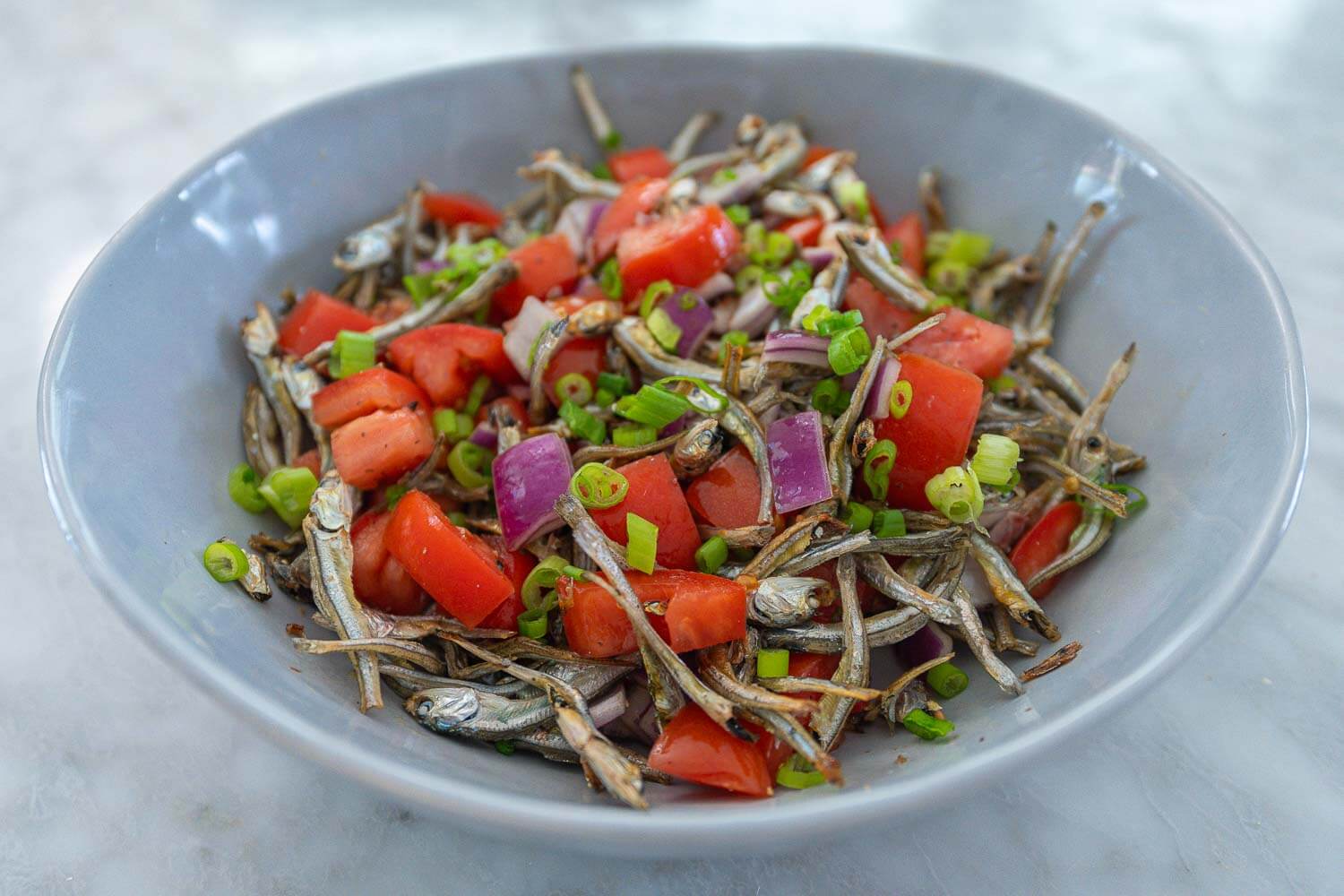 Ensaladang dilis with tomato and onion