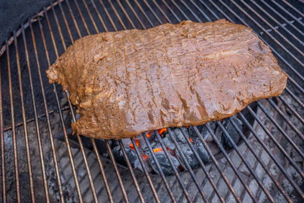 Marinate the flank steak